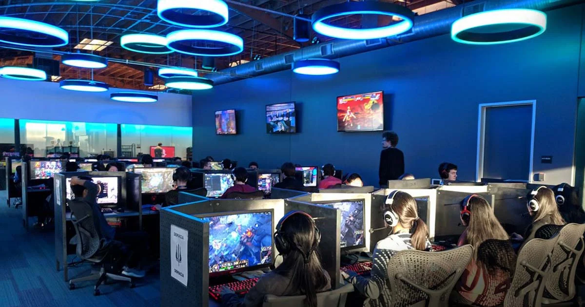 people playing video game in a video game center 